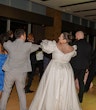 Bride wearing Juniper by Sottero and Midgley dancing