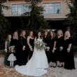 Bride With Bridesmaids. Bride Wearing Simple Ball Gown Wedding Dress With An Elegant Overskirt Called Kyrie By Maggie Sottero