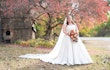 Bride Wearing Sparkly Aline Wedding Dress Called Anniston By Maggie Sottero By An Old Building