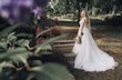 Bride Wearing Lace Aline Bridal Gown Called Harlem By Maggie Sottero In A Garden