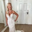 Bride Wearing Lace Mermaid Wedding Dress Called Bronson By Sottero And Midgley With Dog Sitting On Her Train