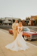 Groom With Bride Wearing Ethereal Beaded Mermaid Bridal Dress Geddes By Maggie Sottero 