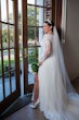 Bride wearing Lorraine Dawn wedding dress by Rebecca Ingram