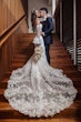 Bride wearing Ryker wedding dress by Sottero and Midgley being kissed by her husband