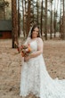 Bride Wearing Lace Wedding Dress Called Ladonna By Maggie Sottero In A Forest