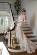 Bride wearing Kern by Maggie Sottero on the stairs