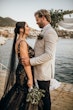 Bride Wearing Black Fit And Flare Wedding Dress Called Zander Lane By Sottero And Midgley Looking At The Groom