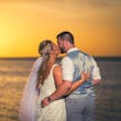 Groom With Bride Wearing Boho-Chic Lace A-Line Wedding Dress Courtney By Rebecca Ingram