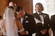 Bride Wearing Classic Elegant Wedding Dress Called Sebastiane By Maggie Sottero With Groom Crying During Vows