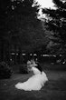 Bride wearing Holden wedding dress by Sottero and Midgley kissing her husband