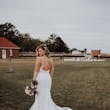 Bride Wearing Beaded Fit-n-flare Wedding Dress Called Jonah Lane By Sottero And Midgley On A Farm