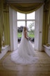 Bride In Lace A-Line Wedding Dress Called Taylor By Maggie Sottero With Long Veil