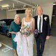 Bride wearing Mindel wedding dress by Maggie Sottero with her parents