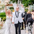 Bride Wearing Lace Mermaid Wedding Dress Called Bronson By Sottero And Midgley Holding Hands With Groom Walking Down The Aisle