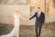 Bride Wearing Glamorous Lace And Sequin Wedding Dress Called Tuscany By Maggie Sottero Holding Hands Looking At Groom