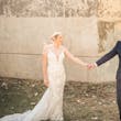 Bride Wearing Glamorous Lace And Sequin Wedding Dress Called Tuscany By Maggie Sottero Holding Hands Looking At Groom