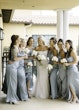 Bride Wearing Pearl Sparkly Bridal Gown Called Drew By Maggie Sottero Laughing With Bridesmaids