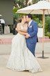 bride in sheer sequin lace  wedding dress called roxanne by sottero and midgley