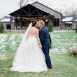 Bride Wearing Ballerina-inspired Romantic Wedding Dress Called Fairbanks By Maggie Sottero Kissing Groom