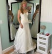 Bride posing in wedding dress called Vernice