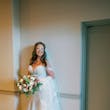 Bride Wearing Sexy Lace Wedding Dress Called Lennon By Maggie Sottero Holding A Bouquet