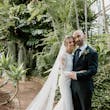 Bride wearing Bethany wedding dress by Rebecca Ingram with her husband