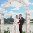 Bride Wearing Lace A-Line Wedding Dress Called Tuscany Lane By Maggie Sottero With Groom At Disneyland