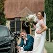 Groom With Bride Wearing Ivory Satin Sheath Wedding Dress Ettia By Maggie Sottero