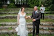 Groom With Bride Wearing Lace Fit-And-Flare Daphne By Rebecca Ingram 