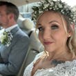 Bride In Long Sleeve Lace Wedding Dress Called Iris By Rebecca Ingram In Flower Crown