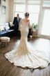 Bride Wearing Beaded Lace Off-the-Shoulder Wedding Gown Called Elias by Sottero and Midgley