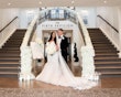 Bride in fit-and-flare wedding dress called Alistaire by Maggie Sottero with groom 