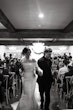 Bride Wearing Pearl Sparkly Wedding Dress Called Drew By Maggie Sottero Walking Down The Aisle With Groom