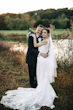 Bride Wearing Nature Lace Wedding Dress Called Albany By Maggie Sottero And Groom Next To A Pond