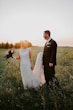 Groom With Bride Wearing Lace Wedding Dress With Illusion Back Verina Marie By Maggie Sottero