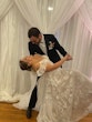 Bride wearing Keisha wedding dress by Maggie Sottero dancing with her husband