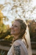 Bride Wearing Asymmetrical Wedding Gown Winona By Rebecca Ingram