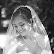 Bride wearing Marguerite wedding dress by Maggie Sottero