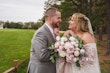 Bride wearing Bronson by Sottero and Midgley laughing with her husband