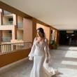Bride Wearing Sheath and Beaded Wedding Dress Called Doritte By Maggie Sottero Walking