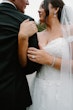 Bride Wearing Lace Princess Dress Called Harlem By Maggie Sottero Holding Grooms Arm