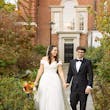 Bride Wearing Satin Aline Wedding Dress Called Ekaterina By Maggie Sottero Holding Hands With Groom