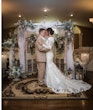 Bride Wearing Modest Lace Wedding Dress Called Tuscany Leigh By Maggie Sottero With Groom