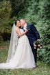 Bride Wearing Ballerina-inspired Romantic Wedding Dress Called Fairbanks By Maggie Sottero In The Forest With Groom