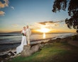 Real Bride in Boho Oversized Floral Lace Wedding Dress with Deep V-Neckline and Pearl Buttons Called Burke by Maggie Sottero