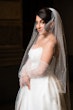 Bride Wearing Modern Ballgown Wedding Dress Called Aspen By Sottero And Midgley With Pearl Veil