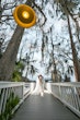 Bride In Off The Shoulder Lace Wedding Dress Called Edison By Maggie Sottero With Groom