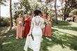 Bride Wearing Crepe And Lace Bridal Dress Called Dionne By Rebecca Ingram First Look With Bridesmaids