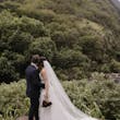 Bride On Beach With Groom In Strapless Wedding Dress Called Monaco By Maggie Sottero