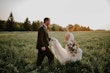 Groom With Bride Wearing Lace Wedding Dress With Illusion Back Verina Marie By Maggie Sottero